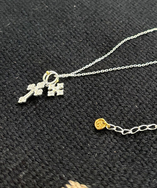 Deux Croix Etincelantes NC